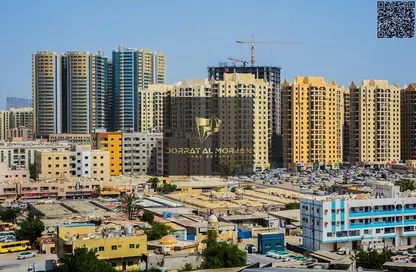 شقة - غرفة نوم - 2 حمامات للبيع في أورينت تاور 1 - أورينت تاور - البستان - عجمان