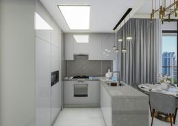 صورةمطبخ لـ: شقة - 1 غرفة نوم - 1 حمام للبيع في زا باراجون لآي جي او - الخليج التجاري - دبي, صورة 1