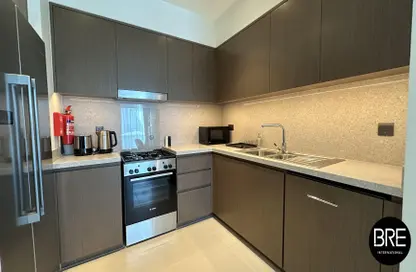 Kitchen image for: Apartment - 2 Bedrooms - 2 Bathrooms for rent in Act Towers - Opera District - Downtown Dubai - Dubai, Image 1