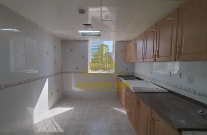 Kitchen image for: Apartment - 1 Bedroom - 2 Bathrooms for rent in City Center Building - Hamdan Street - Abu Dhabi, Image 1