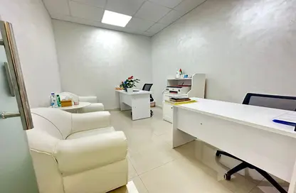 Office image for: Office Space - Studio - 6 Bathrooms for rent in Al Rostamani Building - Port Saeed - Deira - Dubai, Image 1