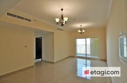 Empty Room image for: Apartment - 1 Bedroom - 1 Bathroom for sale in 7 Seasons building - Phase 2 - International City - Dubai, Image 1