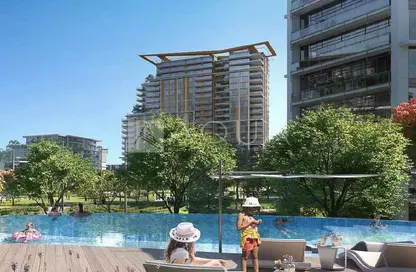 Pool image for: Apartment - 1 Bedroom - 1 Bathroom for sale in Viridian - Central Park at City Walk - City Walk - Dubai, Image 1