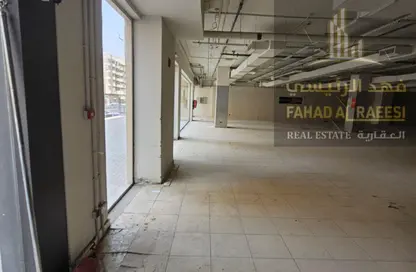 متجر - استوديو - 2 حمامات للايجار في أبراج عجمان وان - الصوان - عجمان