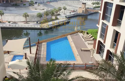 صورة لـ حوض سباحة شقة - غرفة نوم - 2 حمامات للبيع في دبي وورف برج ٣ - القرية التراثية - دبي ، صورة رقم 1