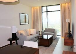 Living Room image for: Apartment - 1 bedroom - 2 bathrooms for sale in Vida Hotel - The Hills - Dubai, Image 1
