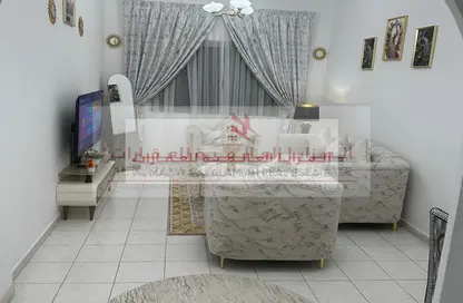 شقة - غرفة نوم - 2 حمامات للايجار في شارع التعاون - التعاون - الشارقة
