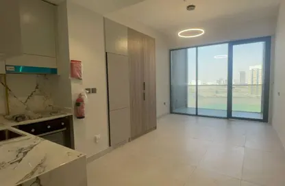 Apartment - Studio - 1 Bathroom for rent in Amal Tower - Dubai Sports City - Dubai