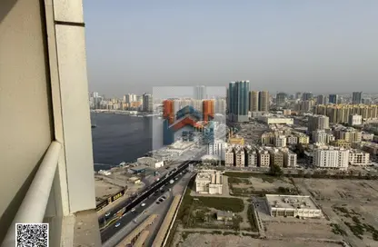 شقة - غرفة نوم - 2 حمامات للايجار في أورينت تاور 1 - أورينت تاور - البستان - عجمان