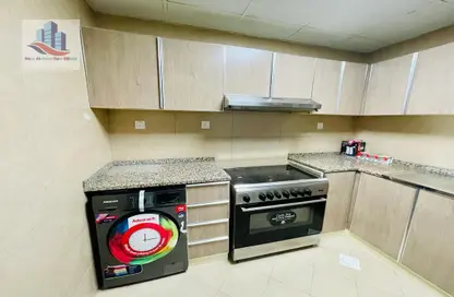 Kitchen image for: Apartment - 2 Bedrooms - 2 Bathrooms for rent in Al Taawun - Sharjah, Image 1