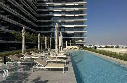 Pool image for: Apartment - 1 Bedroom - 1 Bathroom for sale in Golf Suites - Dubai Hills - Dubai Hills Estate - Dubai, Image 1
