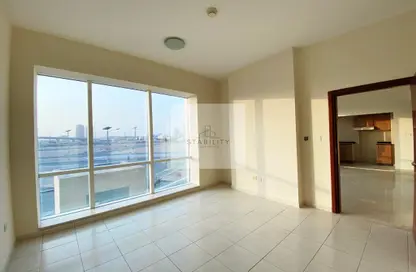 شقة - غرفة نوم - 2 حمامات للايجار في هوكي الجليد - مدينة دبي الرياضية - دبي
