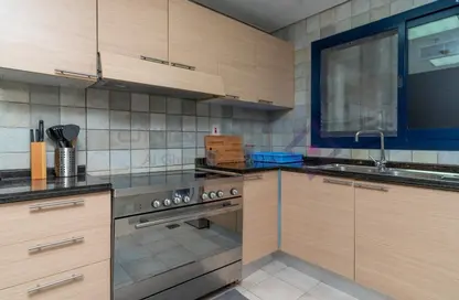 Kitchen image for: Apartment - 2 Bedrooms - 3 Bathrooms for rent in Al Muraqqabat - Deira - Dubai, Image 1