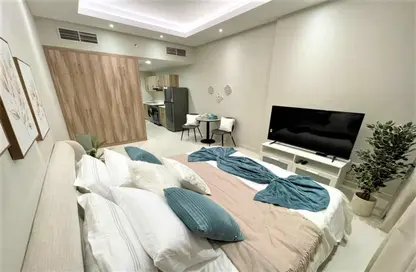 صورة لـ غرفة المعيشة شقة - 2 غرف نوم - 3 حمامات للبيع في برج هيرا - مدينة دبي الرياضية - دبي ، صورة رقم 1
