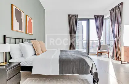 Room / Bedroom image for: Apartment - 2 Bedrooms - 3 Bathrooms for sale in Bahwan Tower Downtown - Downtown Dubai - Dubai, Image 1