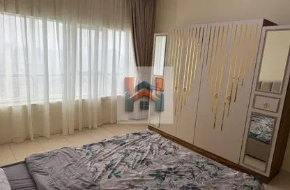 Apartment - 1 Bedroom - 2 Bathrooms for rent in Orient Tower 2 - Orient Towers - Al Bustan - Ajman