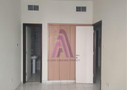 Empty Room image for: Apartment - 1 bedroom - 2 bathrooms for rent in U18 - Italy Cluster - International City - Dubai, Image 1
