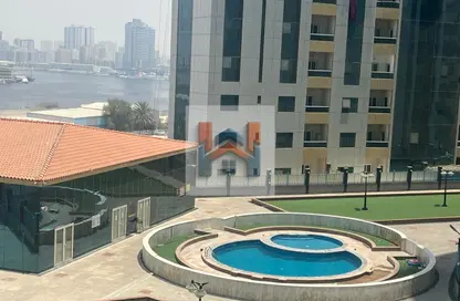 شقة - غرفة نوم - 2 حمامات للايجار في أورينت تاور 2 - أورينت تاور - البستان - عجمان