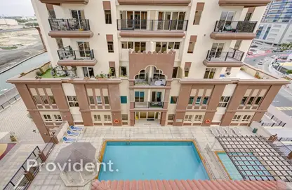 Pool image for: Apartment - 1 Bathroom for sale in Spanish Tower - Dubai Sports City - Dubai, Image 1