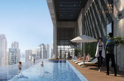 Pool image for: Apartment - 1 Bedroom - 2 Bathrooms for sale in Marina Living - Dubai Marina - Dubai, Image 1