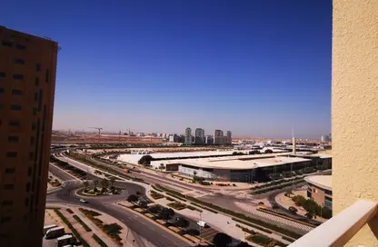 Apartment - 1 Bedroom - 2 Bathrooms for rent in Nasser Building - Dubai Production City (IMPZ) - Dubai