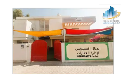Outdoor Building image for: Villa - 5 Bedrooms - 3 Bathrooms for rent in Al Karamah - Abu Dhabi, Image 1