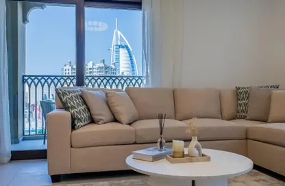 Living Room image for: Apartment - 2 Bedrooms - 2 Bathrooms for rent in Asayel - Madinat Jumeirah Living - Umm Suqeim - Dubai, Image 1