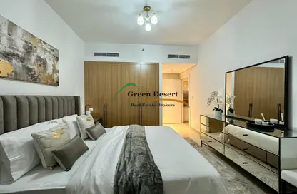 Room / Bedroom image for: Apartment - 2 Bedrooms - 3 Bathrooms for sale in Liwan - Dubai Land - Dubai, Image 1