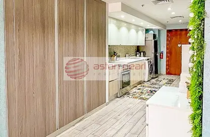صورة لـ مطبخ شقة - 1 حمام للبيع في شمال ريزيدينسيس 2 - قرية الجميرا سركل - دبي ، صورة رقم 1