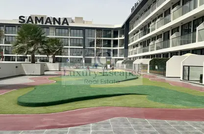 Apartment - 1 Bathroom for sale in Samana Golf Avenue - Dubai Studio City - Dubai