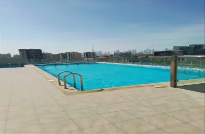 صورة لـ حوض سباحة شقة - غرفة نوم - 2 حمامات للبيع في ايريس آمبر - القرية التراثية - دبي ، صورة رقم 1