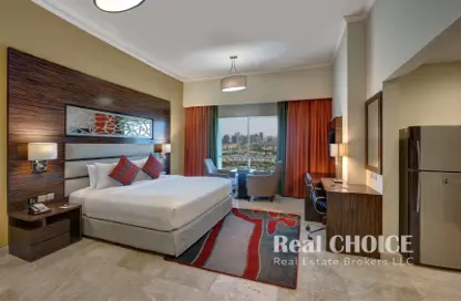 صورة لـ غرفة- غرفة النوم النزل و الشقق الفندقية - 1 حمام للايجار في فندق فينتدج جراند - مدينة دبي للإنتاج (اي ام بي زد) - دبي ، صورة رقم 1