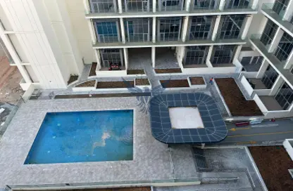 صورة لـ حوض سباحة شقة - غرفة نوم - 2 حمامات للايجار في الواحة 2 - مساكن الواحه - مدينة مصدر - أبوظبي ، صورة رقم 1