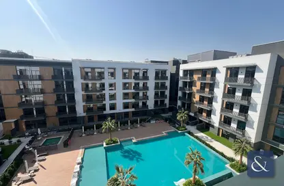 Pool image for: Apartment - 2 Bedrooms - 3 Bathrooms for sale in Belgravia Square - Jumeirah Village Circle - Dubai, Image 1