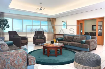 صورة لـ غرفة المعيشة النزل و الشقق الفندقية - 3 غرف نوم - 4 حمامات للايجار في دبي مارينا - دبي ، صورة رقم 1
