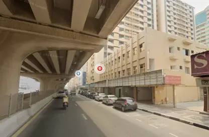 عمارة بالكامل - 8 غرف نوم - 8 حمامات للبيع في بناية أبو شغارة - أبو شغارة - الشارقة
