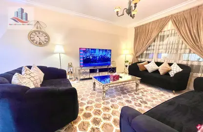 Living Room image for: Apartment - 2 Bedrooms - 2 Bathrooms for rent in Queen Tower - Al Qasba - Sharjah, Image 1