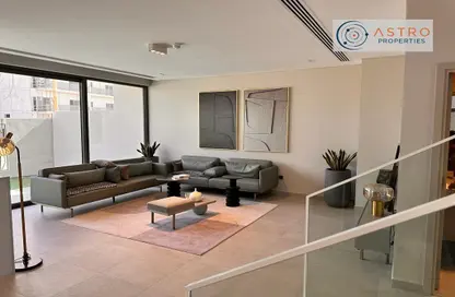 Living Room image for: Villa - 2 Bedrooms - 3 Bathrooms for rent in MAG Eye - District 7 - Mohammed Bin Rashid City - Dubai, Image 1