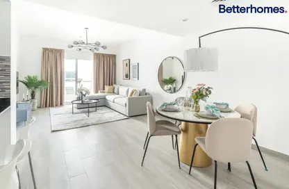 Living / Dining Room image for: Apartment - 1 Bedroom - 1 Bathroom for sale in Al Dhafra 1 - Al Dhafra - Greens - Dubai, Image 1