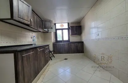 Kitchen image for: Apartment - 1 Bathroom for rent in C2302 - Khalifa City A - Khalifa City - Abu Dhabi, Image 1