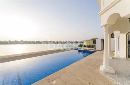Pool image for: Villa - 4 Bedrooms - 6 Bathrooms for rent in Garden Homes Frond P - Garden Homes - Palm Jumeirah - Dubai, Image 1
