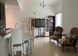 Living / Dining Room image for: Apartment - 1 bedroom - 2 bathrooms for rent in Stadium Point - Dubai Sports City - Dubai, Image 1