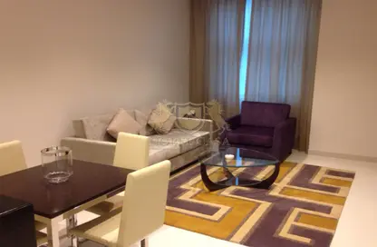 Living / Dining Room image for: Apartment - 1 Bedroom - 2 Bathrooms for rent in Damac Maison Cour Jardin - Business Bay - Dubai, Image 1