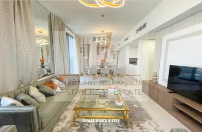 Living Room image for: Apartment - 2 Bedrooms - 3 Bathrooms for sale in Sharjah Waterfront City - Sharjah, Image 1