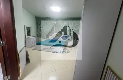 شقة - غرفة نوم - 2 حمامات للايجار في أورينت تاور 1 - أورينت تاور - البستان - عجمان
