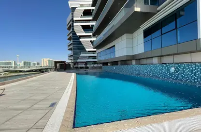 Pool image for: Apartment - 3 Bedrooms - 4 Bathrooms for rent in Al Amirah Building - Al Raha Beach - Abu Dhabi, Image 1