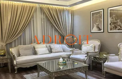 Living Room image for: Villa - 3 Bedrooms - 3 Bathrooms for sale in Aknan Villas - Vardon - Damac Hills 2 - Dubai, Image 1