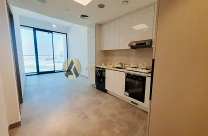 Kitchen image for: Apartment - 1 Bedroom - 2 Bathrooms for rent in Catch Residences By IGO - Jumeirah Village Circle - Dubai, Image 1