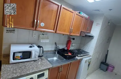 شقة - غرفة نوم - 1 حمام للايجار في أورينت تاور 1 - أورينت تاور - البستان - عجمان