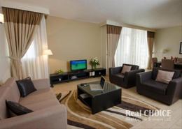 Living Room image for: Hotel and Hotel Apartment - 1 bedroom - 1 bathroom for rent in The Apartments Dubai World Trade Centre A - The Apartments Dubai World Trade Centre - World Trade Center - Dubai, Image 1